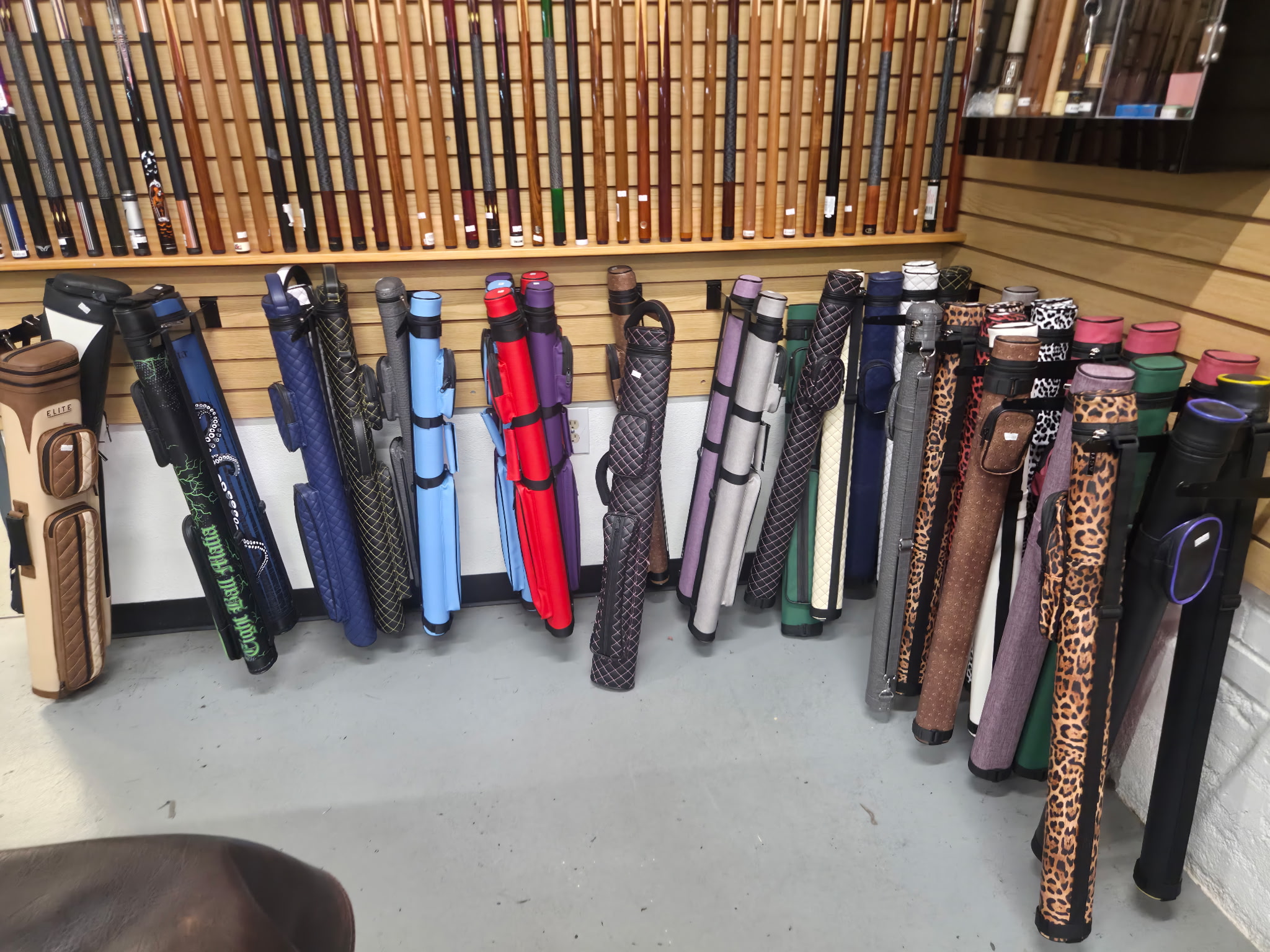 Pool cue cases at Colorado Budget Billiards in Englewood, Colorado
